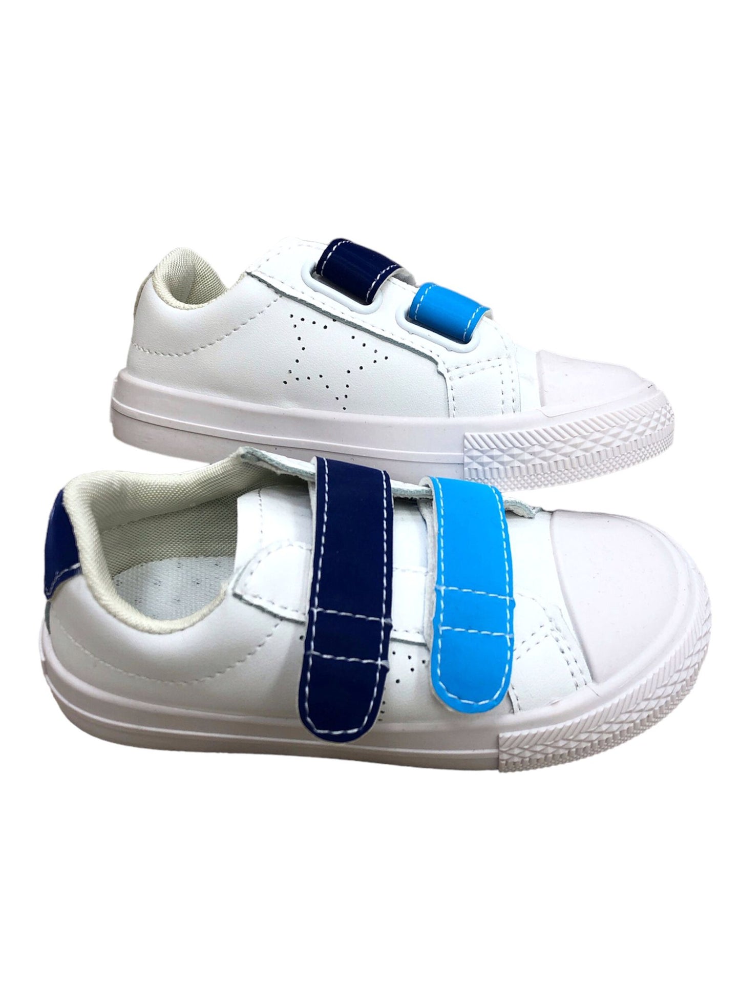 White children's shoes with blue and navy glue