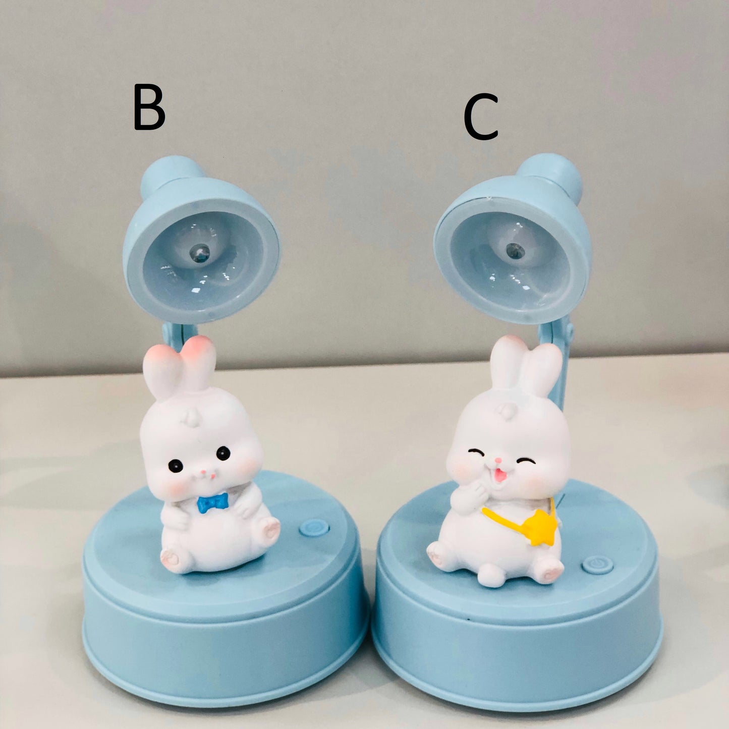 Table lamp, small size, blue plastic, with a masterpiece