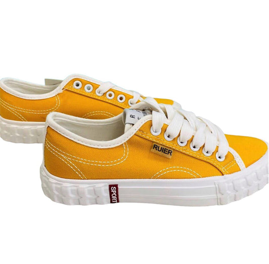 Yellow shoes with white laces