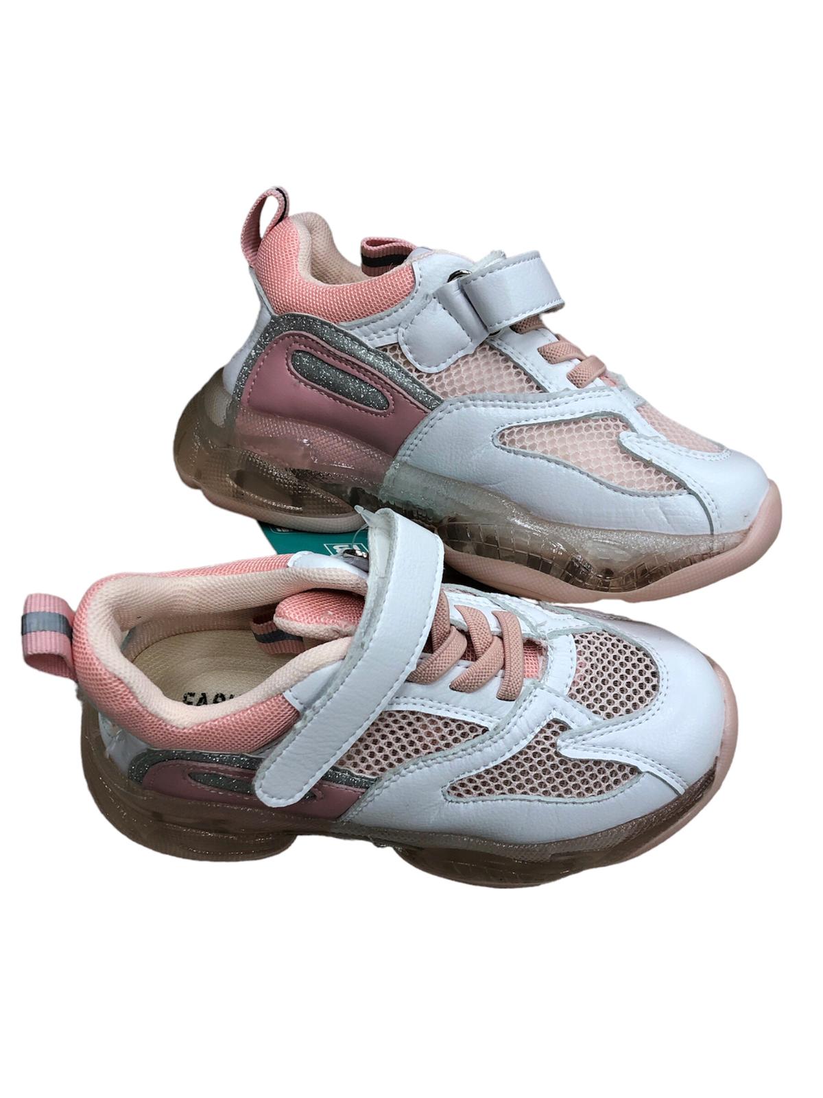 Pink and white children's shoes with an opening at the back