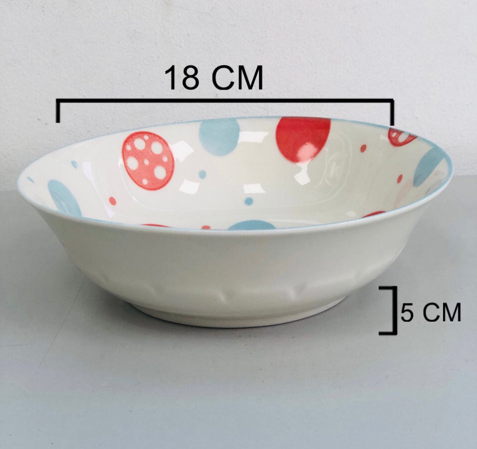 Ceramic plate with rounded circles, 7 inches