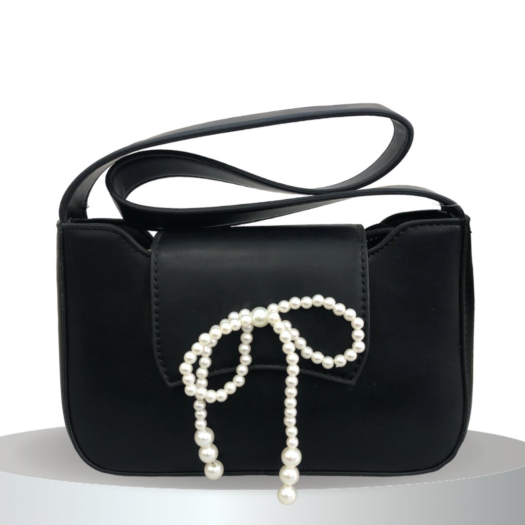 Small women's bag with bow ties