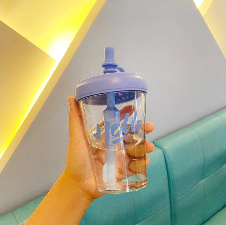 Plastic cup with straw and lid