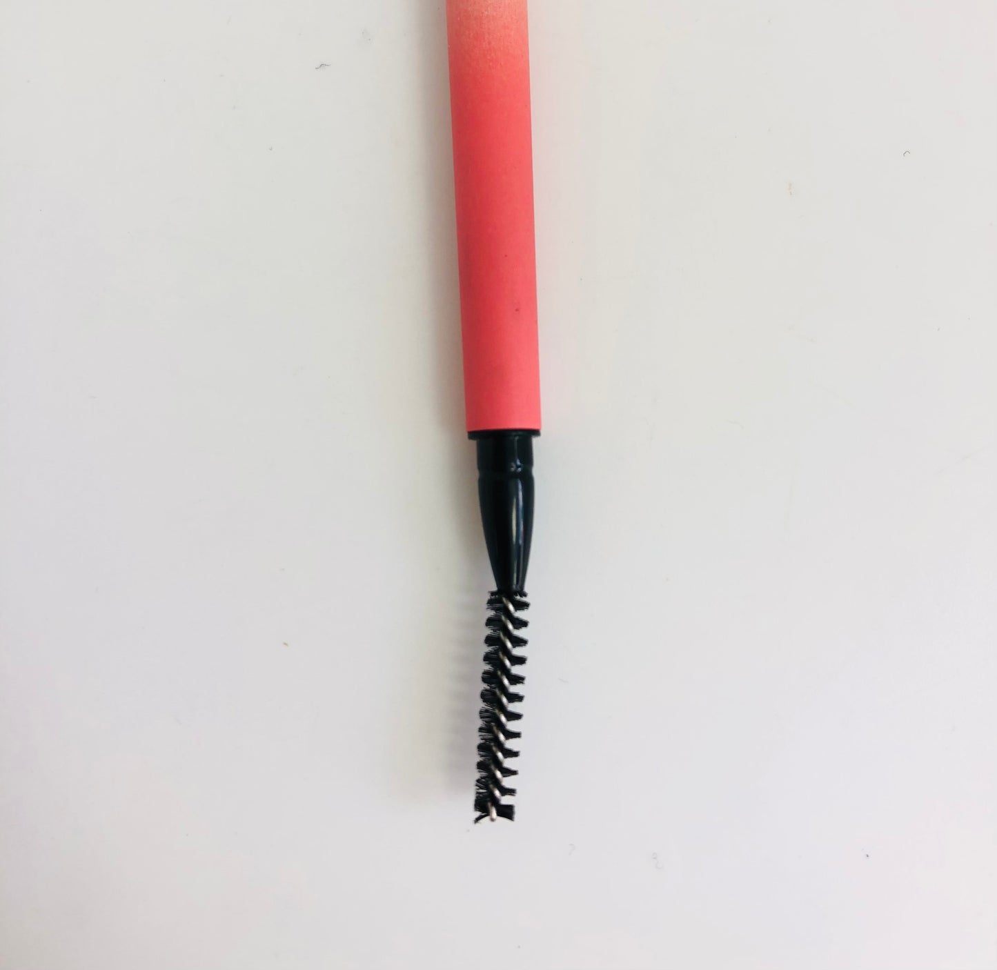 Double-sided eyebrow pencil with comb