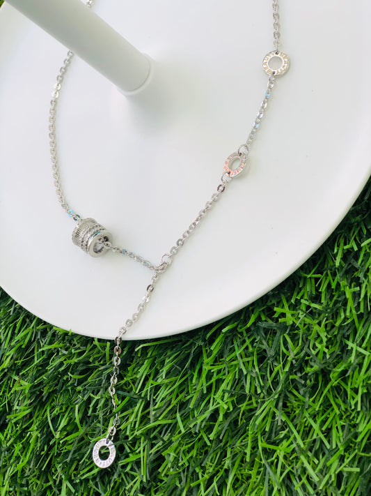 Long cylinder necklace, gold and silver