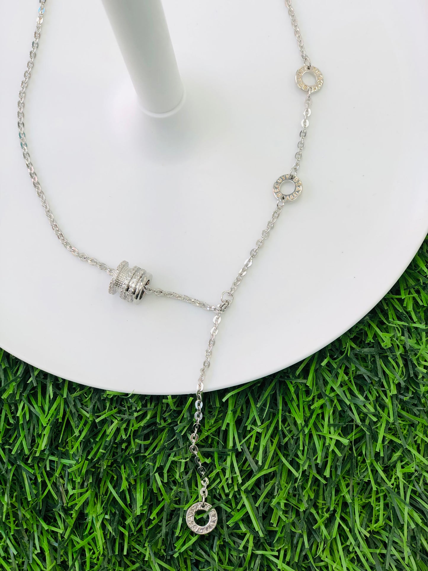Long cylinder necklace, gold and silver