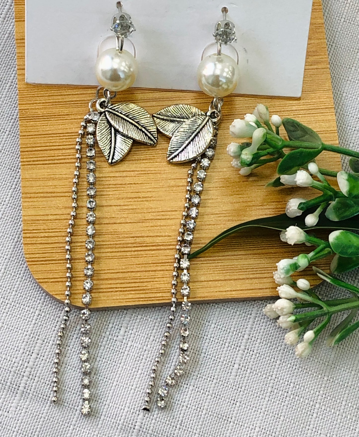 Long silver leaf earring