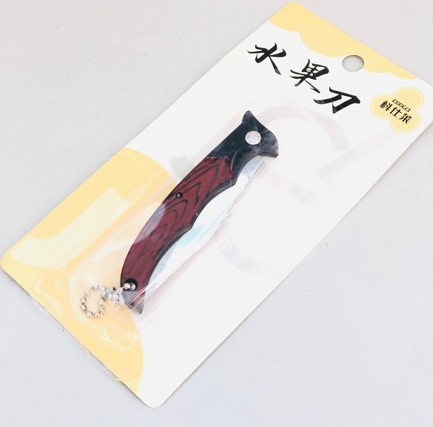Steel razor with foldable wooden handle