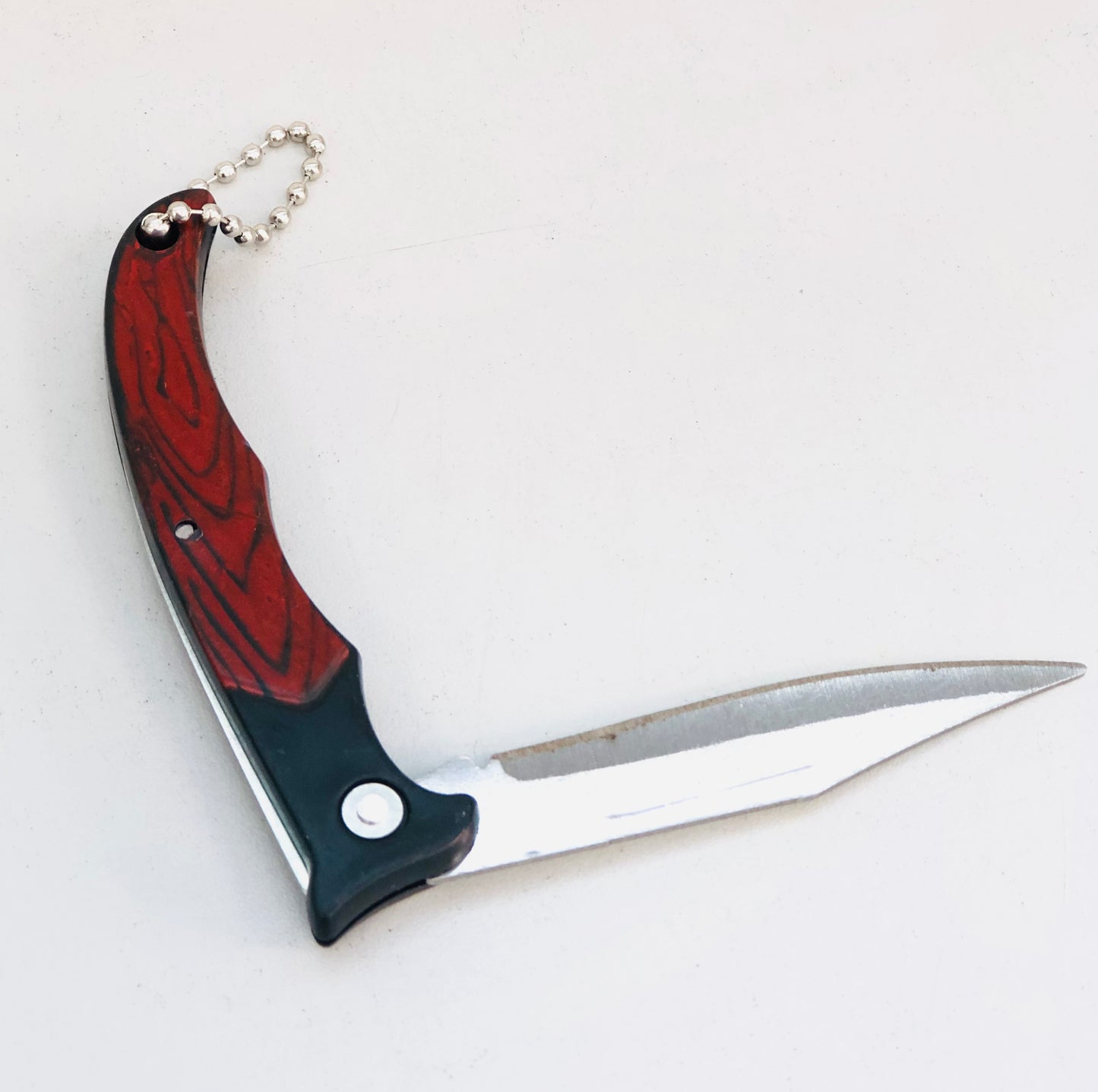 Steel razor with foldable wooden handle
