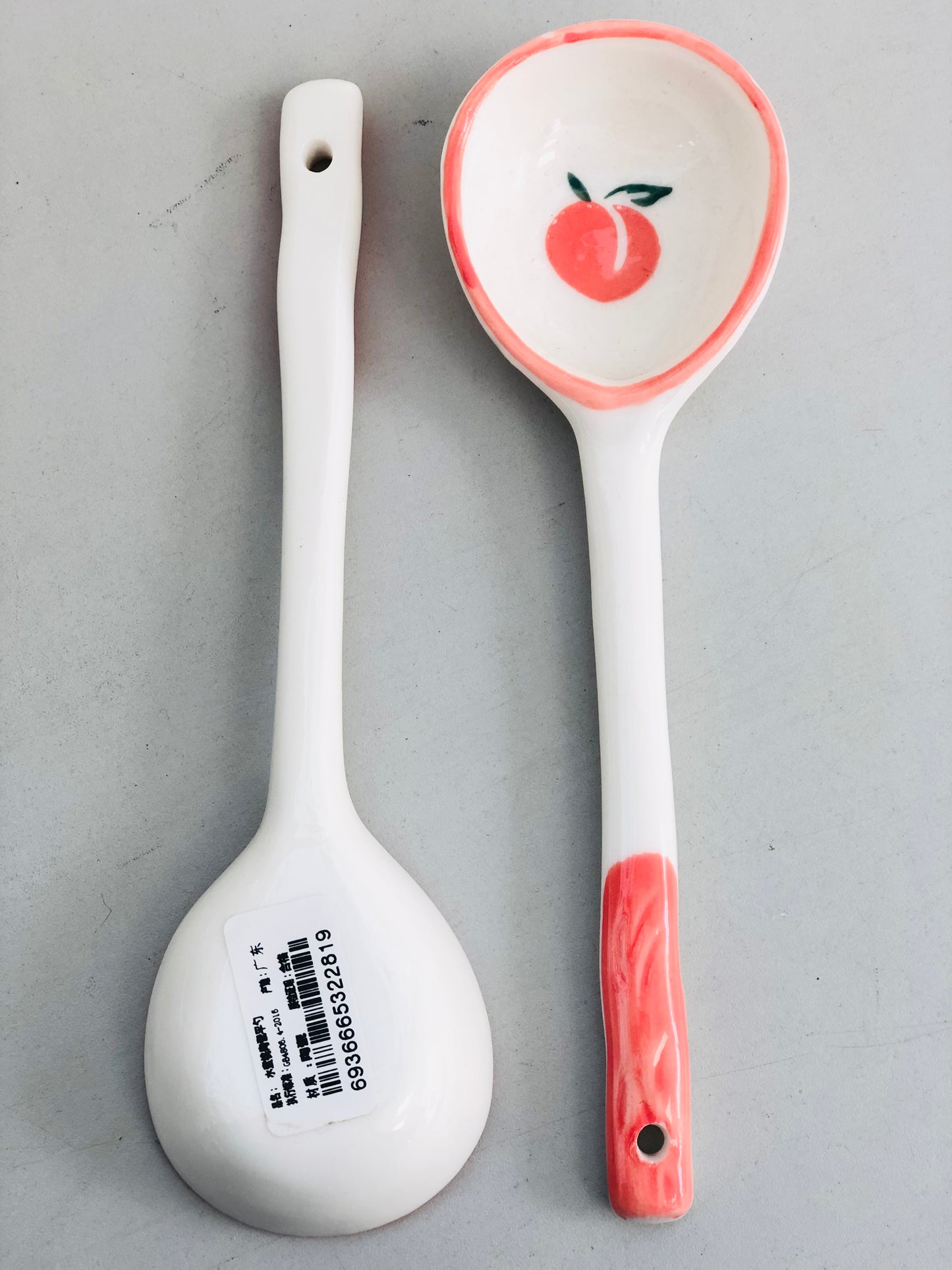 Peach ceramic spoon