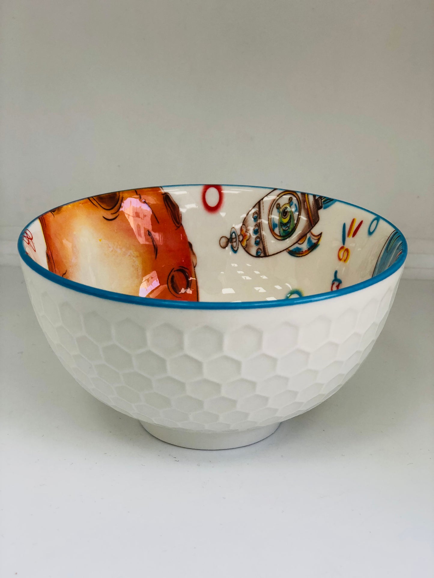 A ceramic dish made of a spaceman