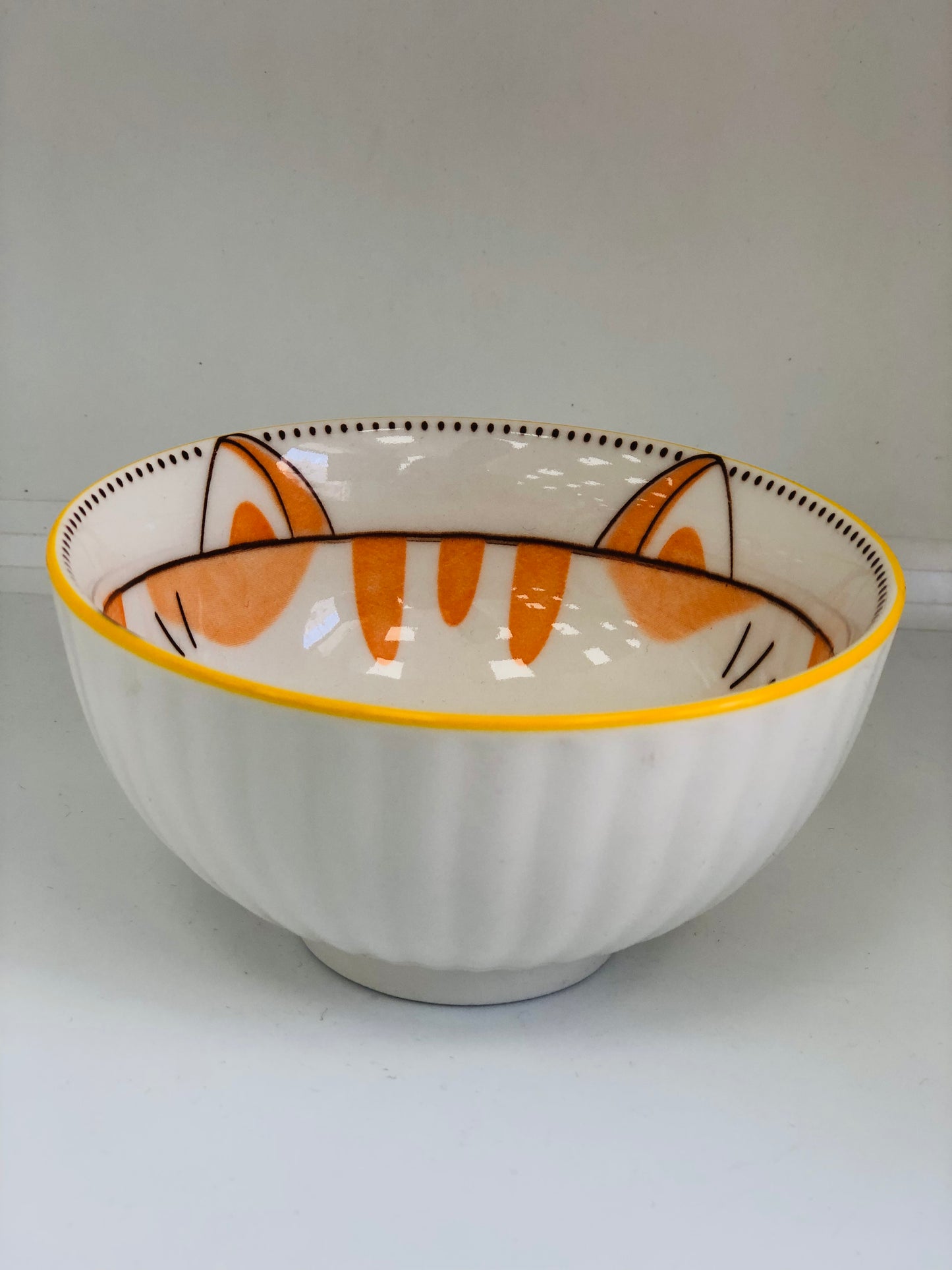 Ceramic dish with a cat