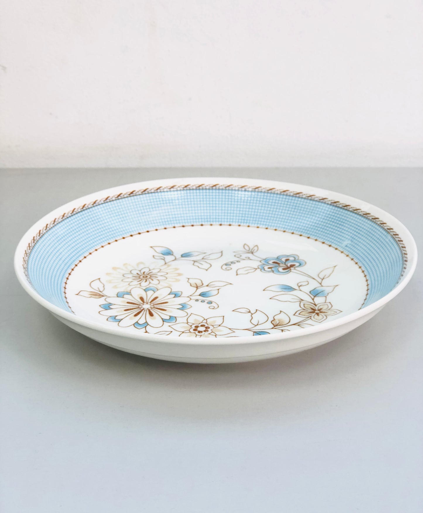 Flat ceramic dish with blue flowers