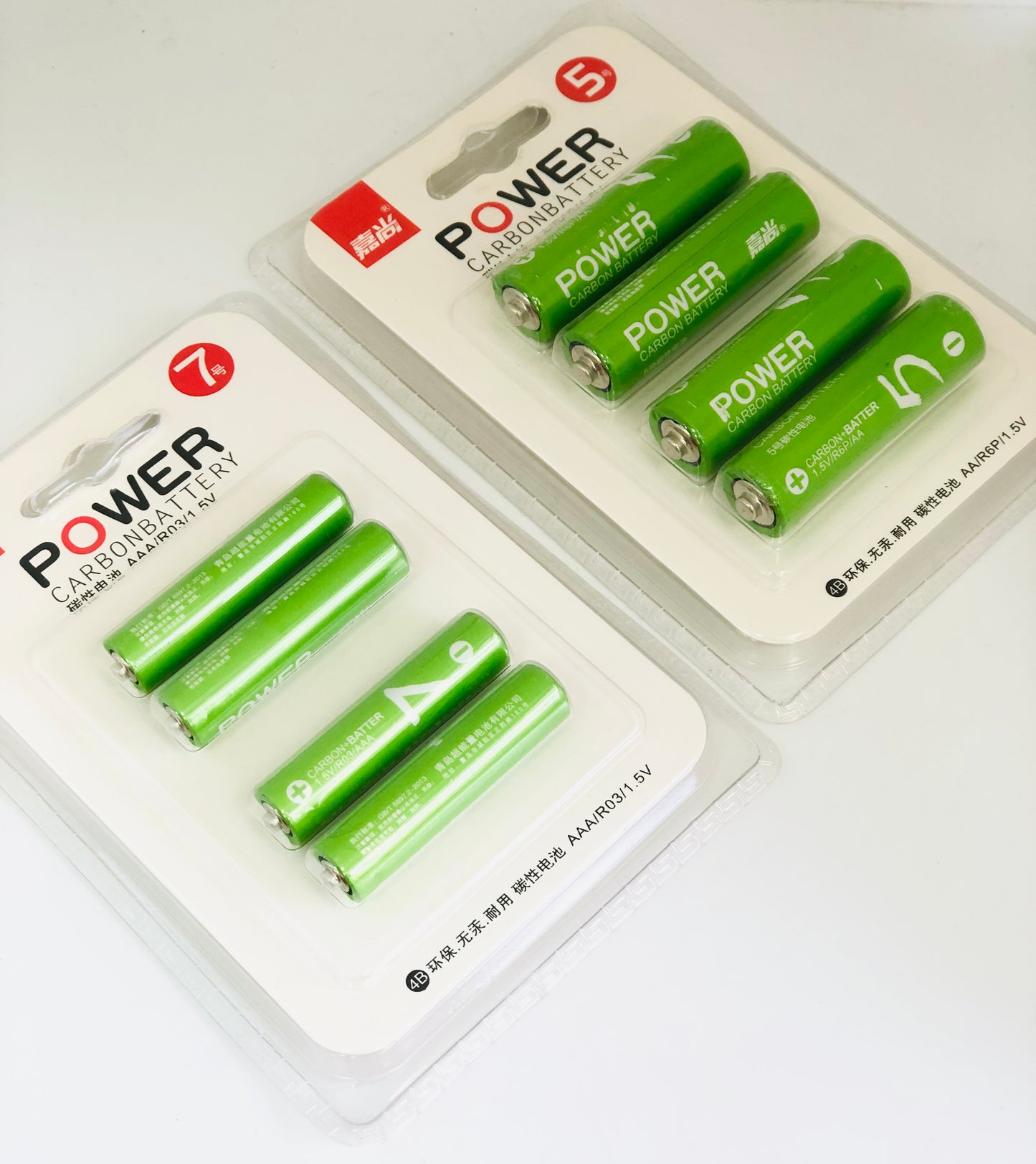 4 green 1.5 volt batteries