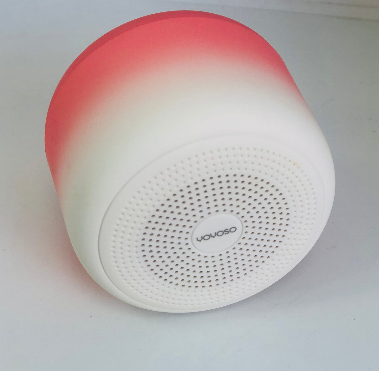 Pink and white wireless speaker