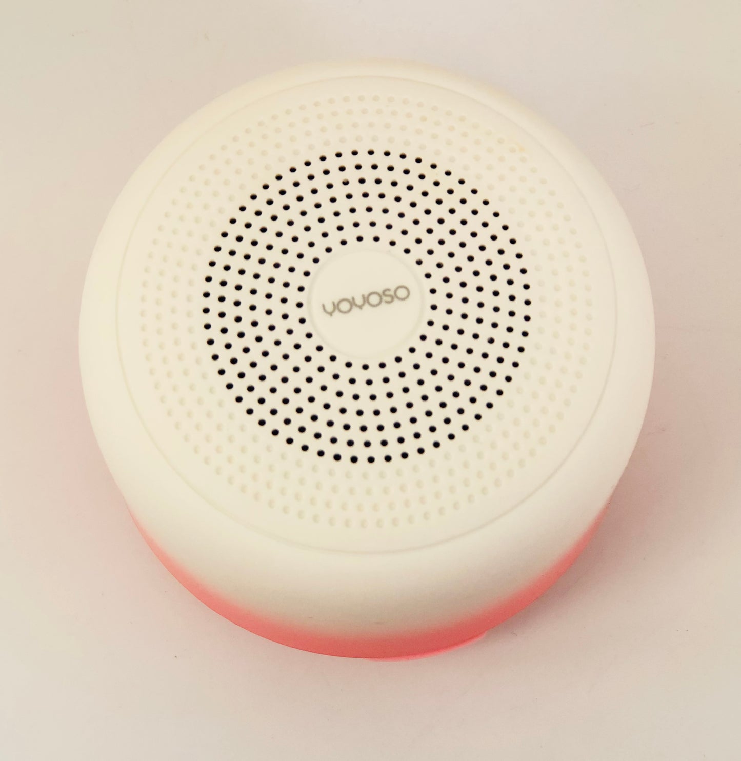 Pink and white wireless speaker