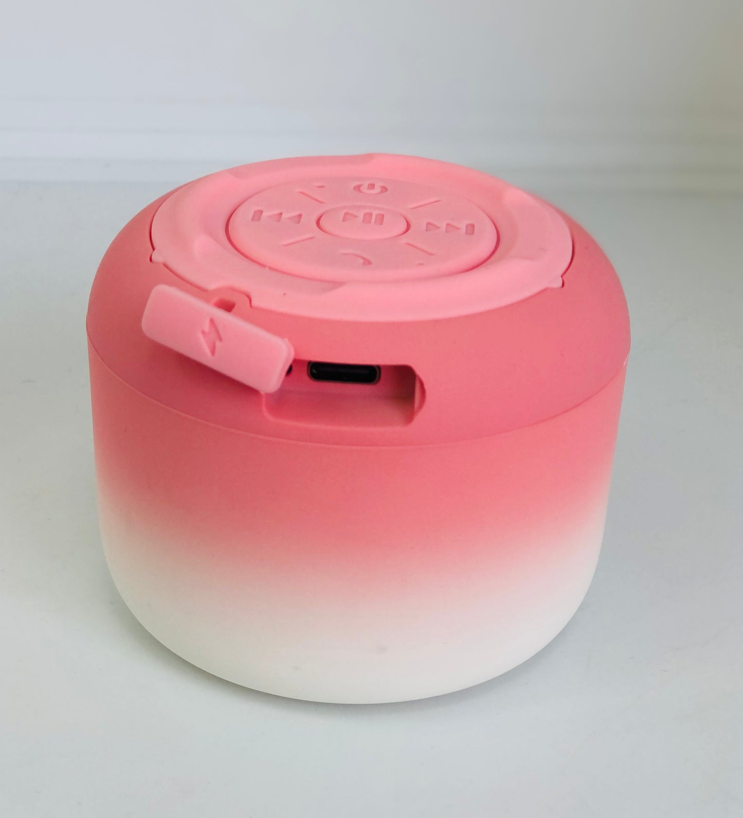 Pink and white wireless speaker