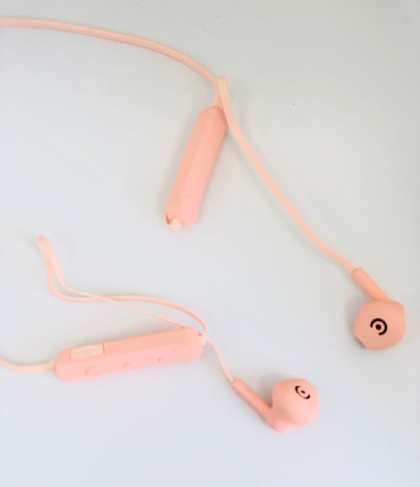 Pink wireless earbuds