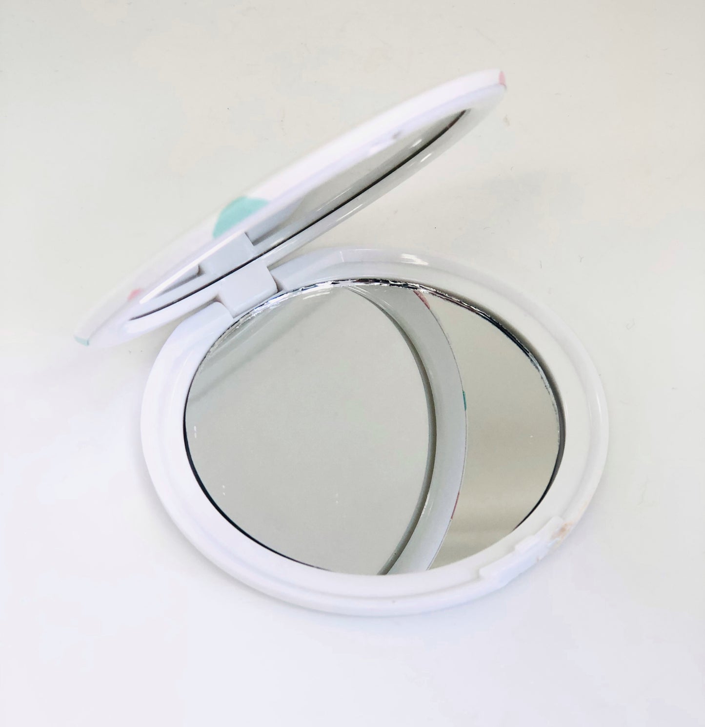 Small circular dotted mirror