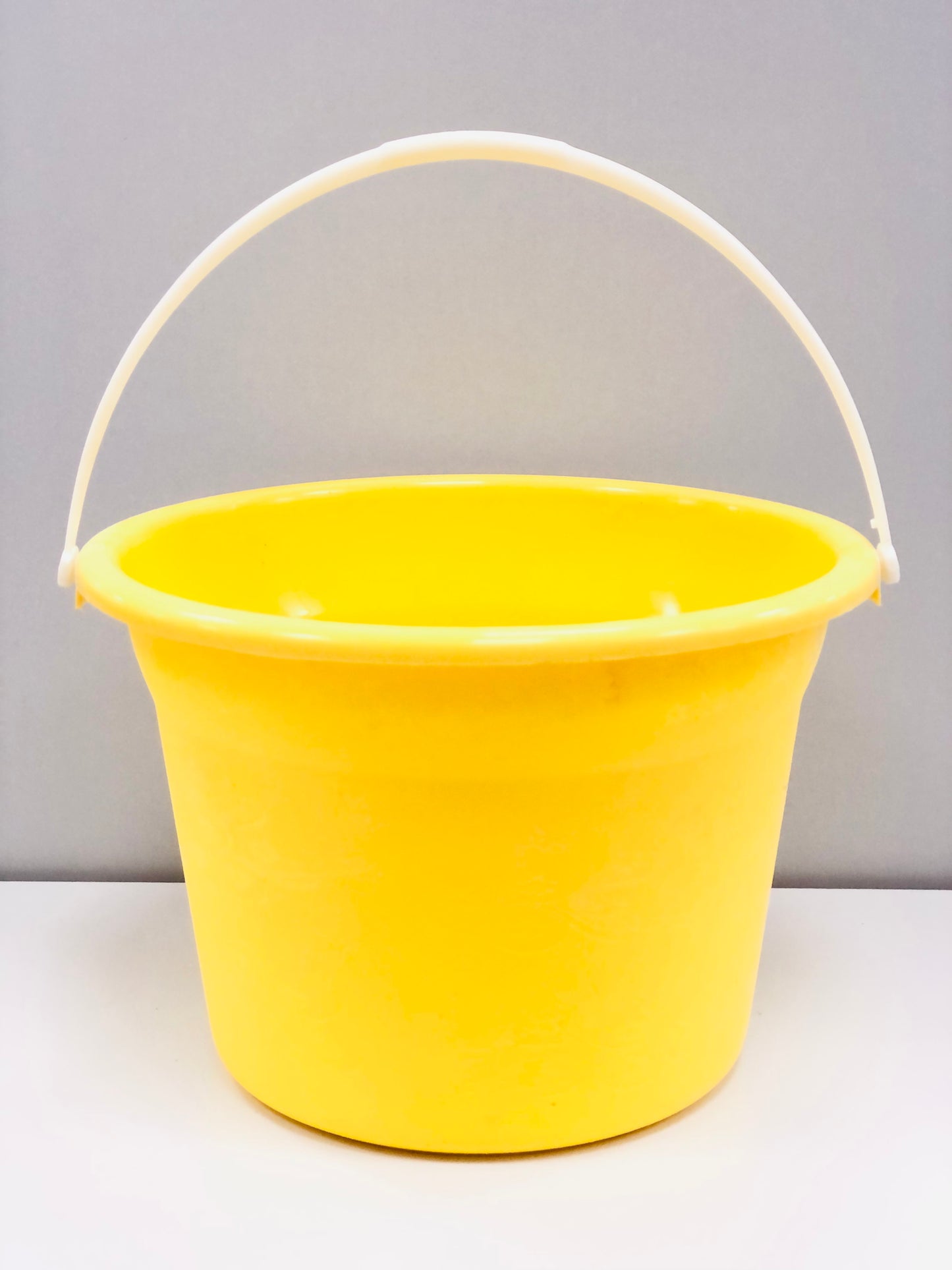 Colorful plastic bucket with handle