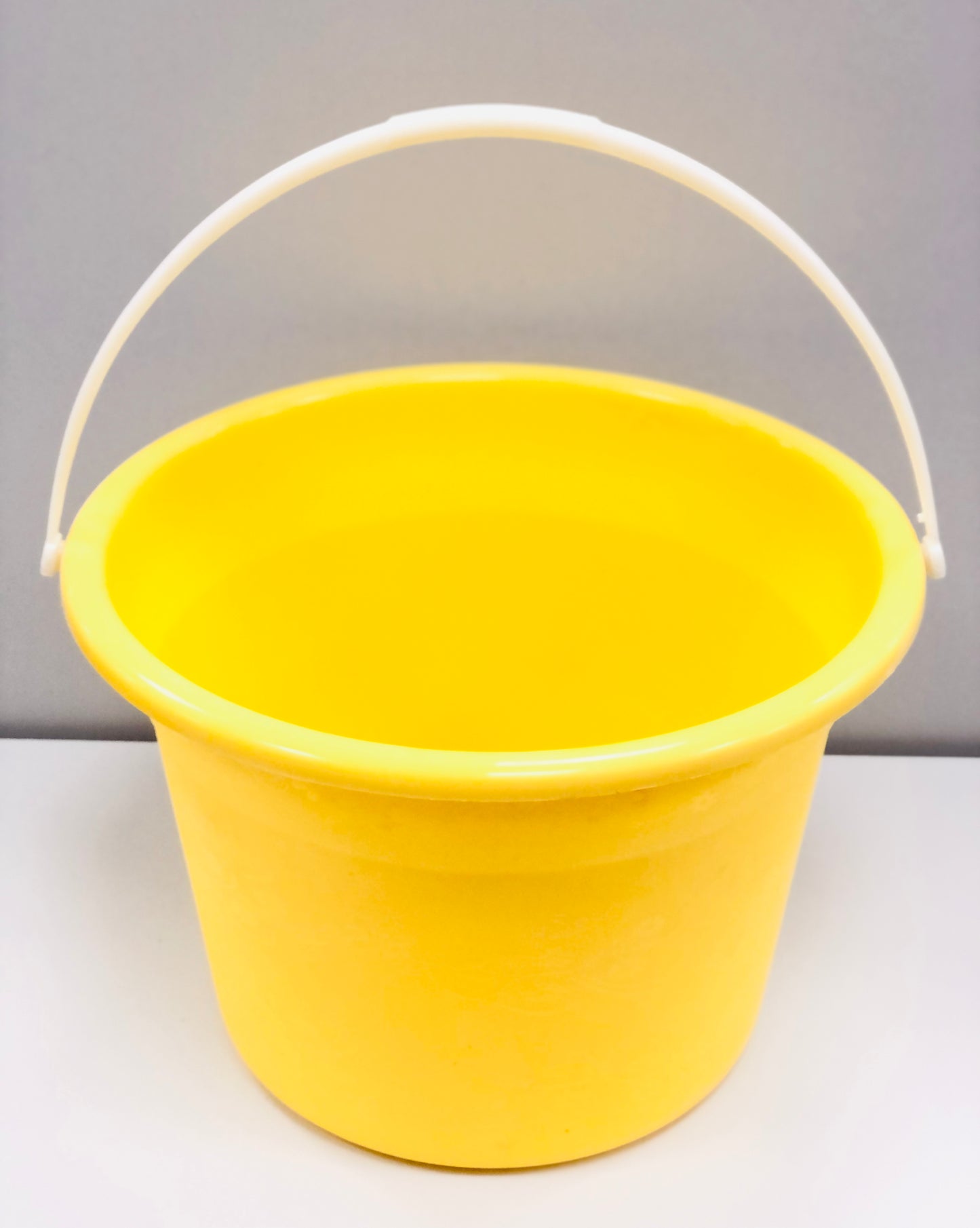 Colorful plastic bucket with handle