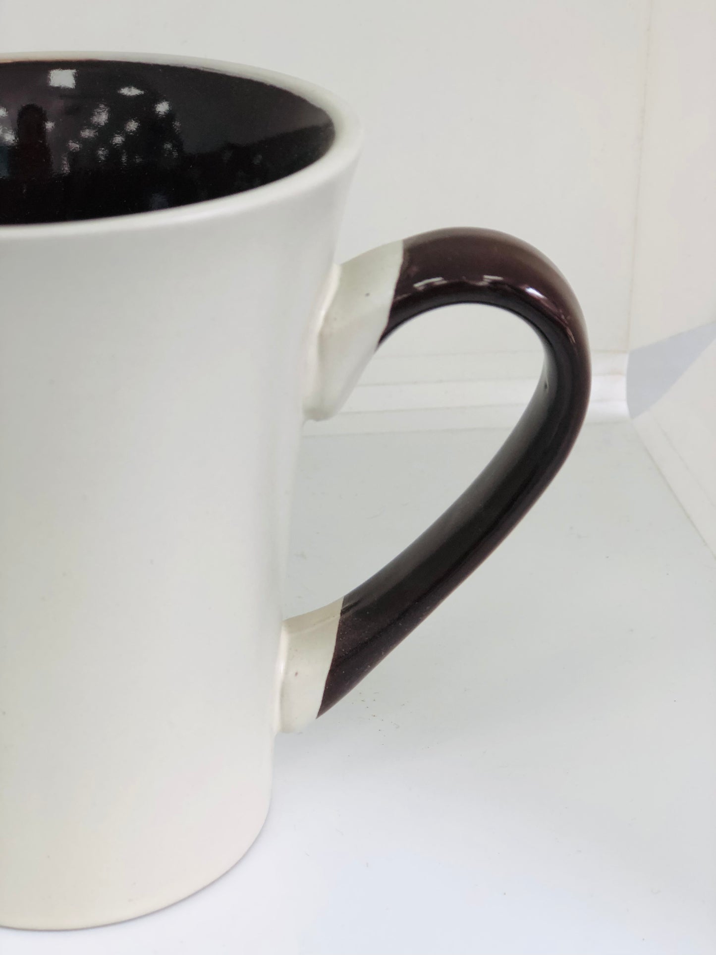 Beige and brown long ceramic mug