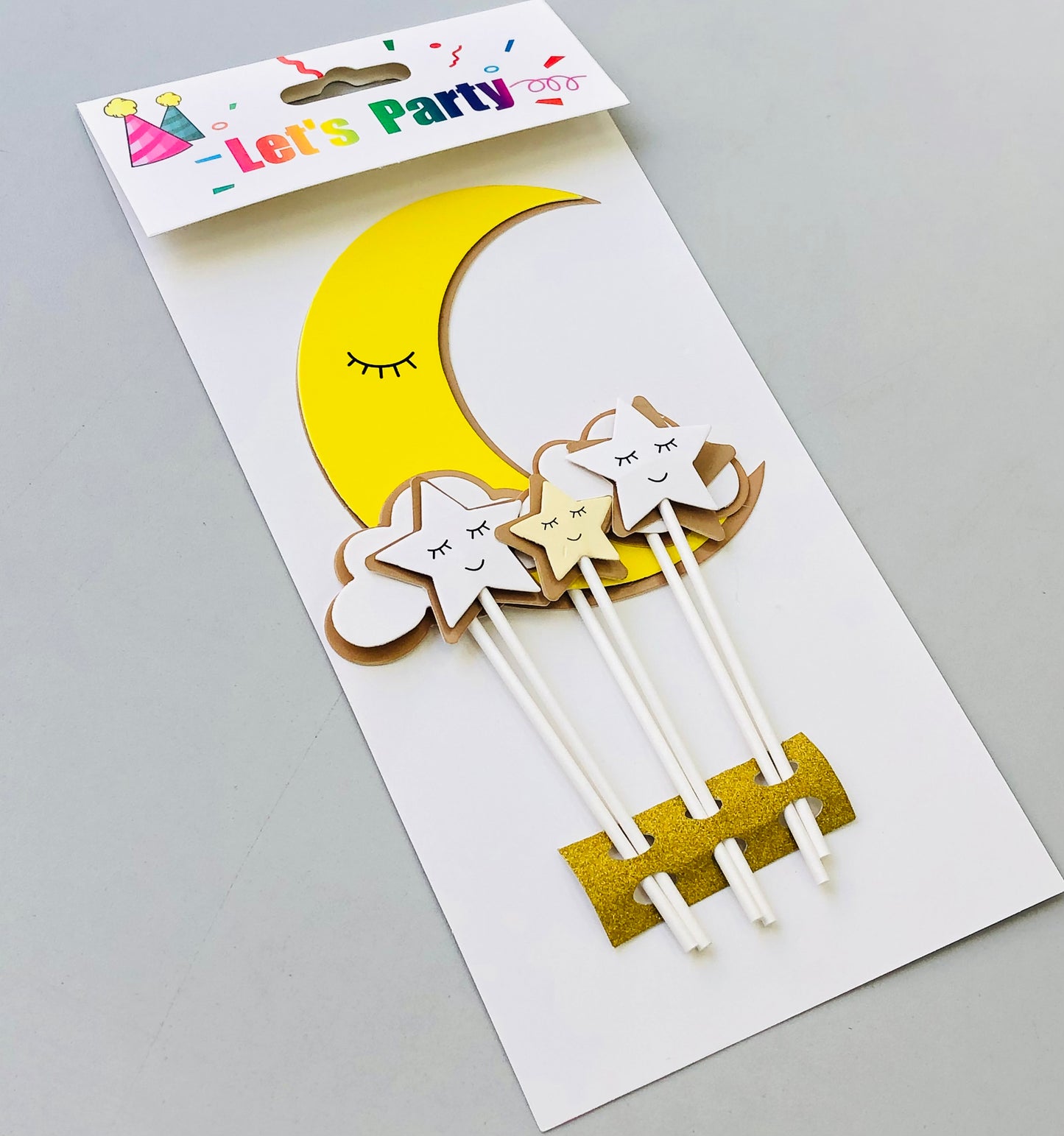 Moon and star paper cake decorations