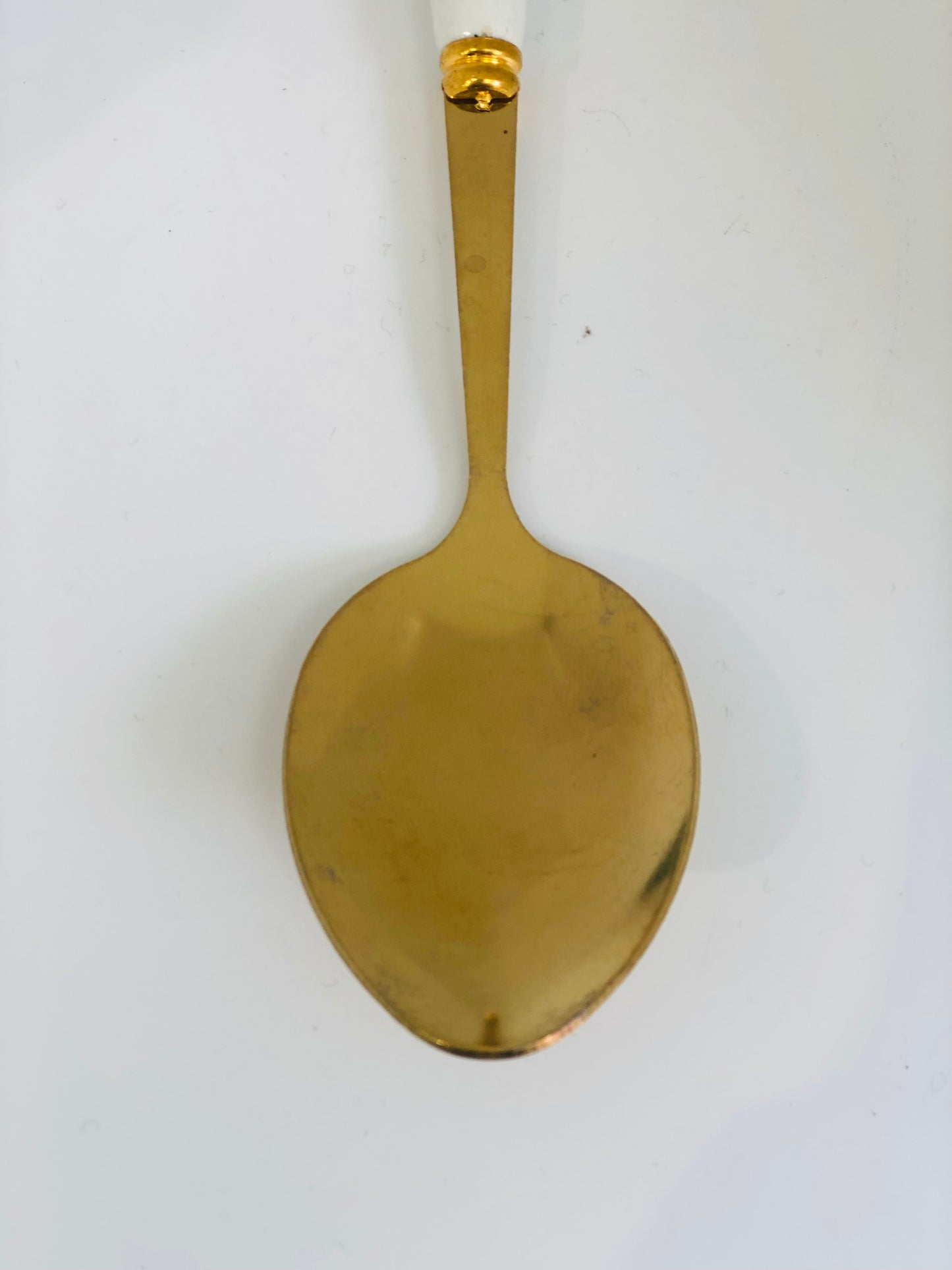 White ceramic pendant decorated with gold