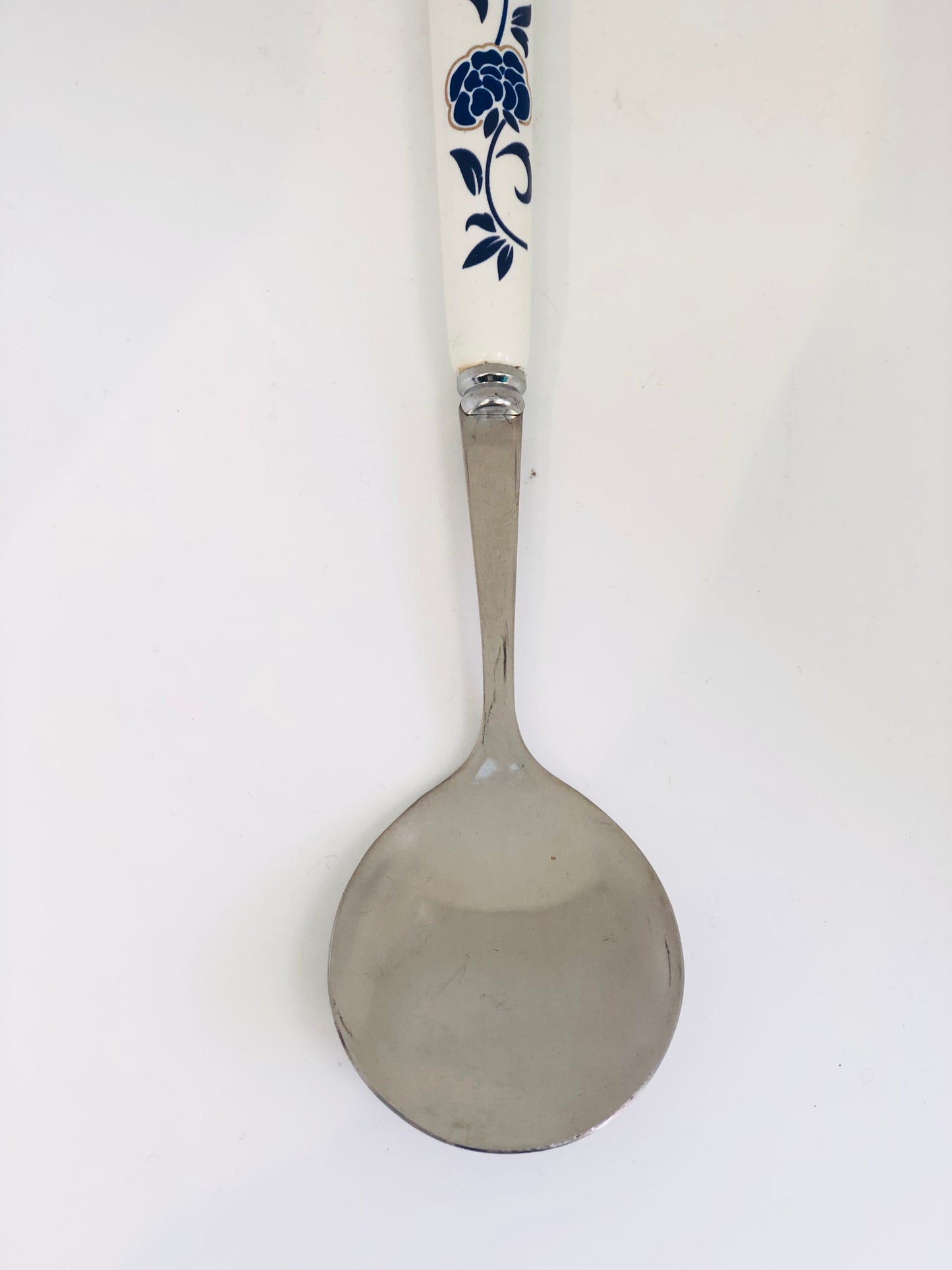 White ceramic pendant decorated with blue