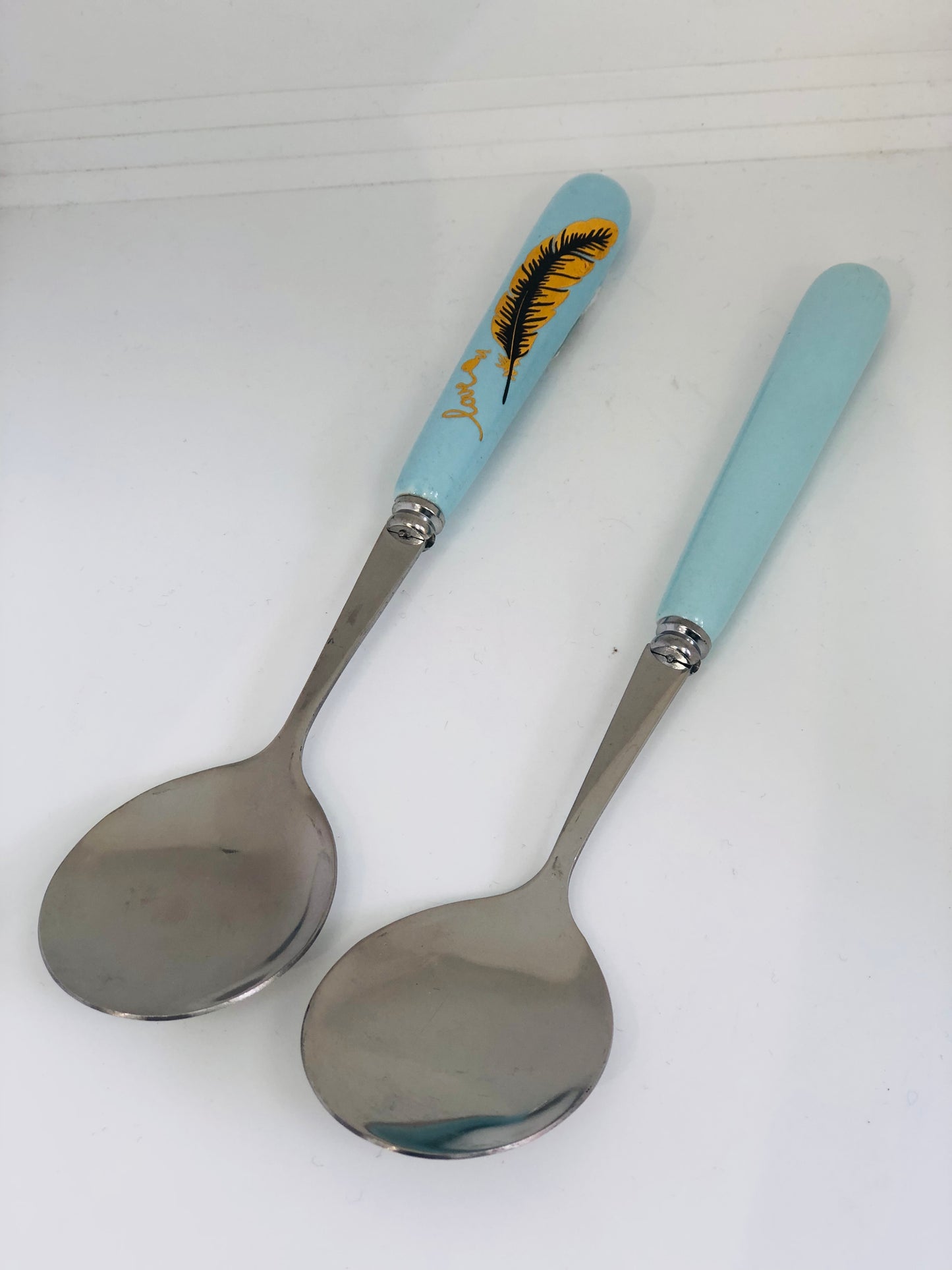 Light blue ceramic spoon