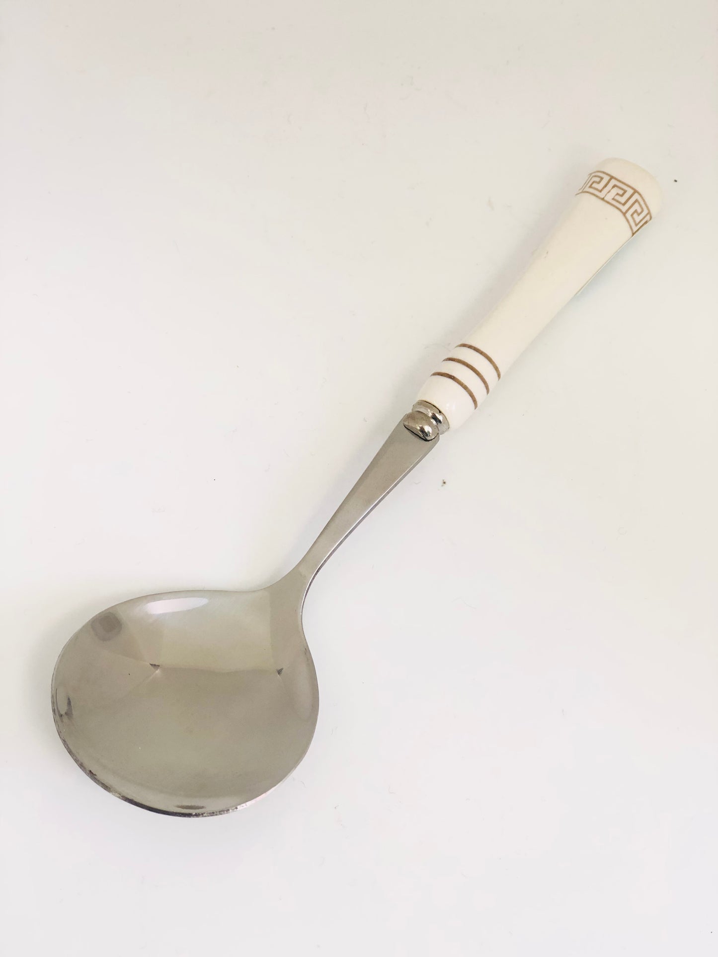 White ceramic spoon, fork and knife set