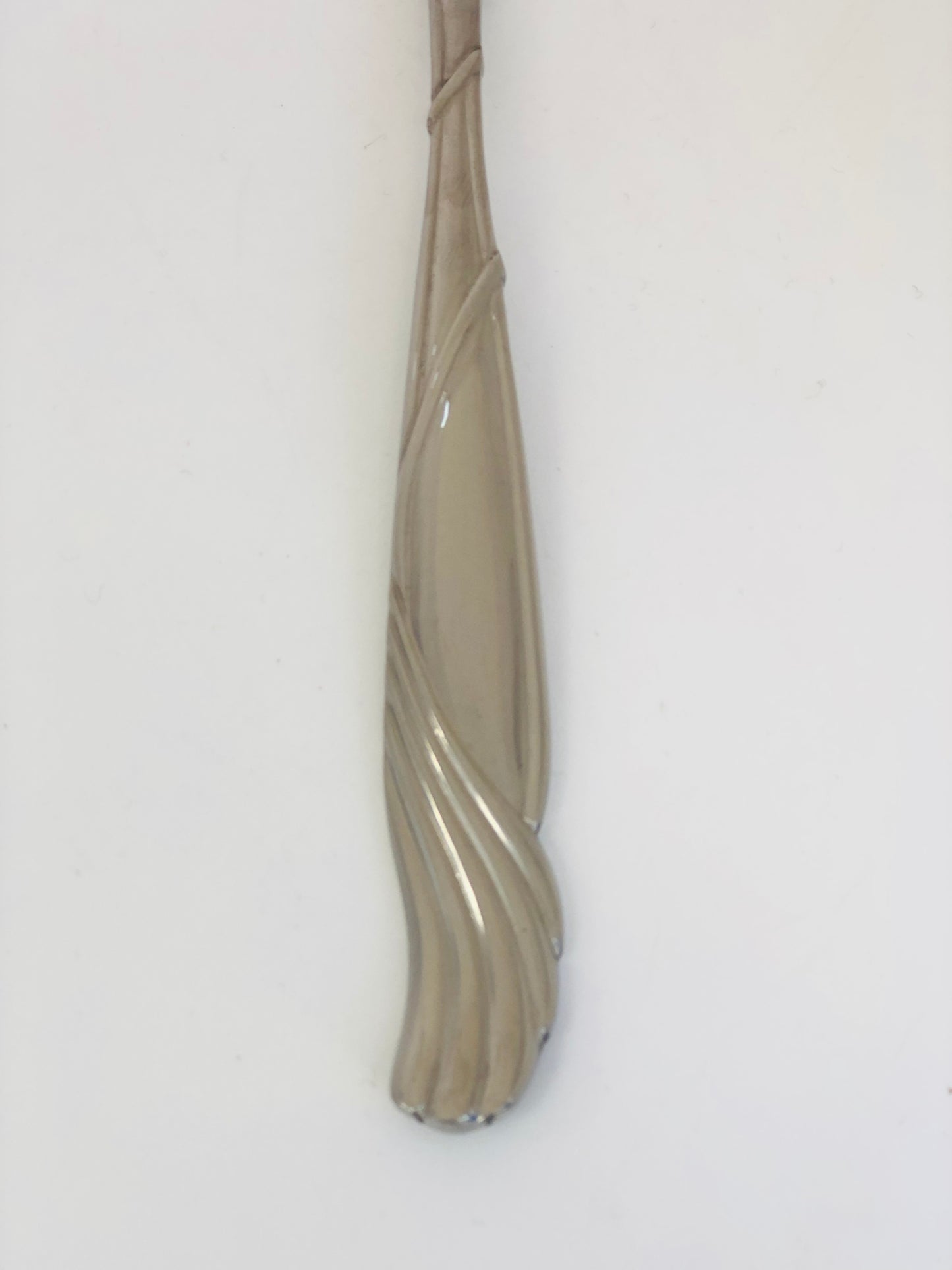 Stainless steel spoons with decorative handle