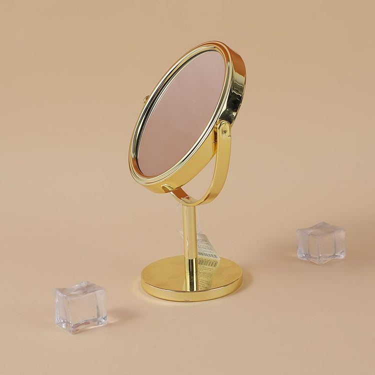 Small gold mirror with base