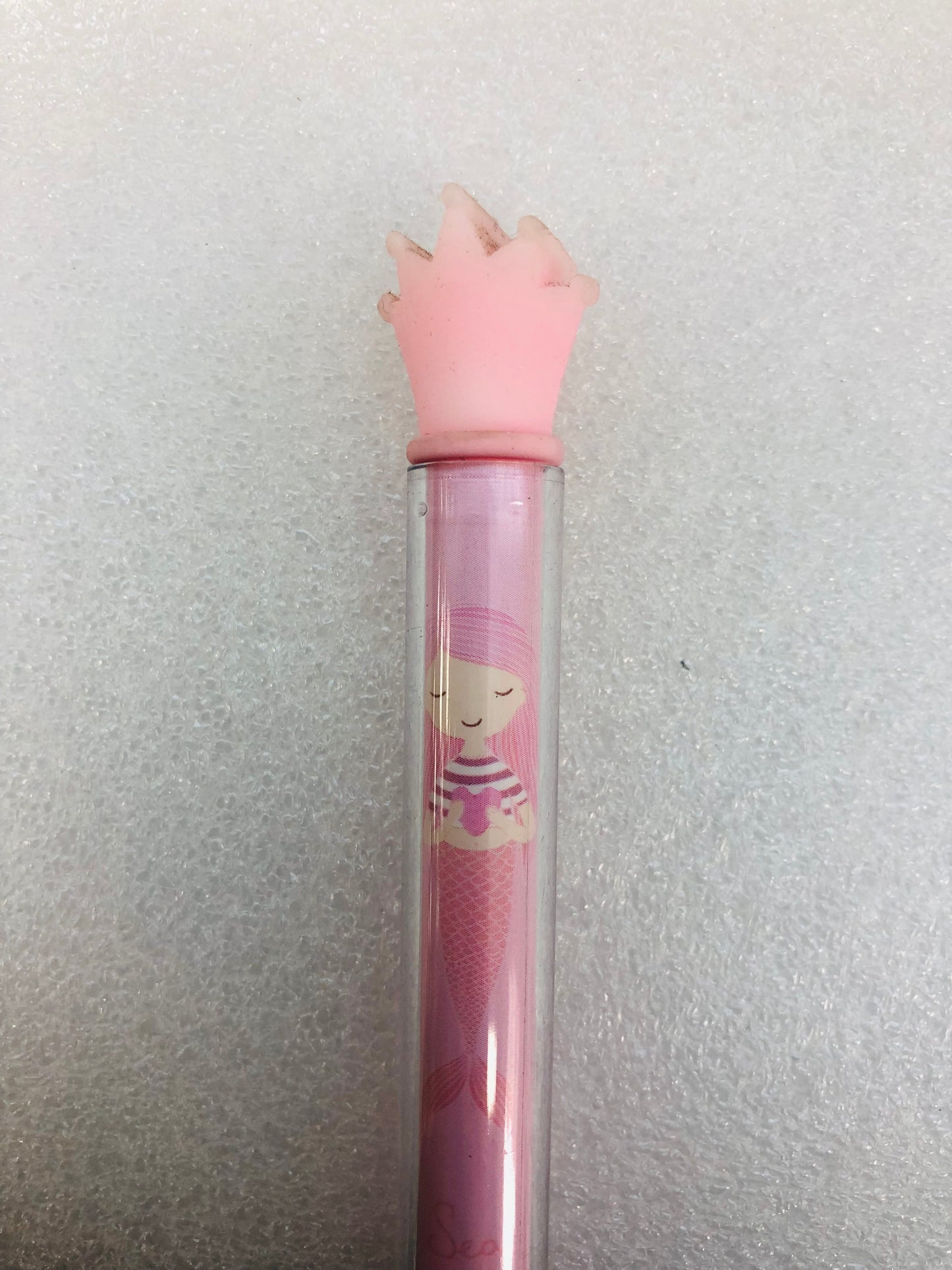 Black ink pen with long transparent cap