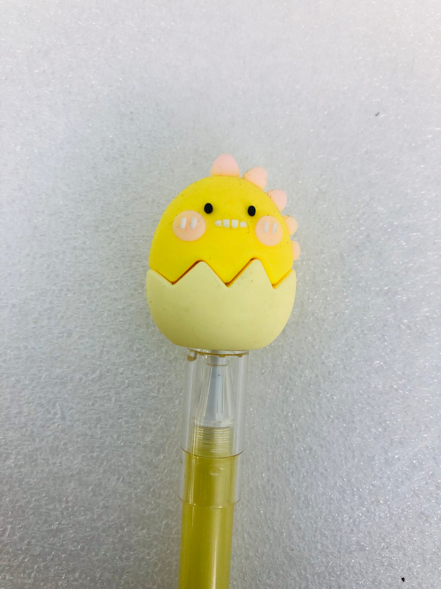 Dinosaur head blue ink pen