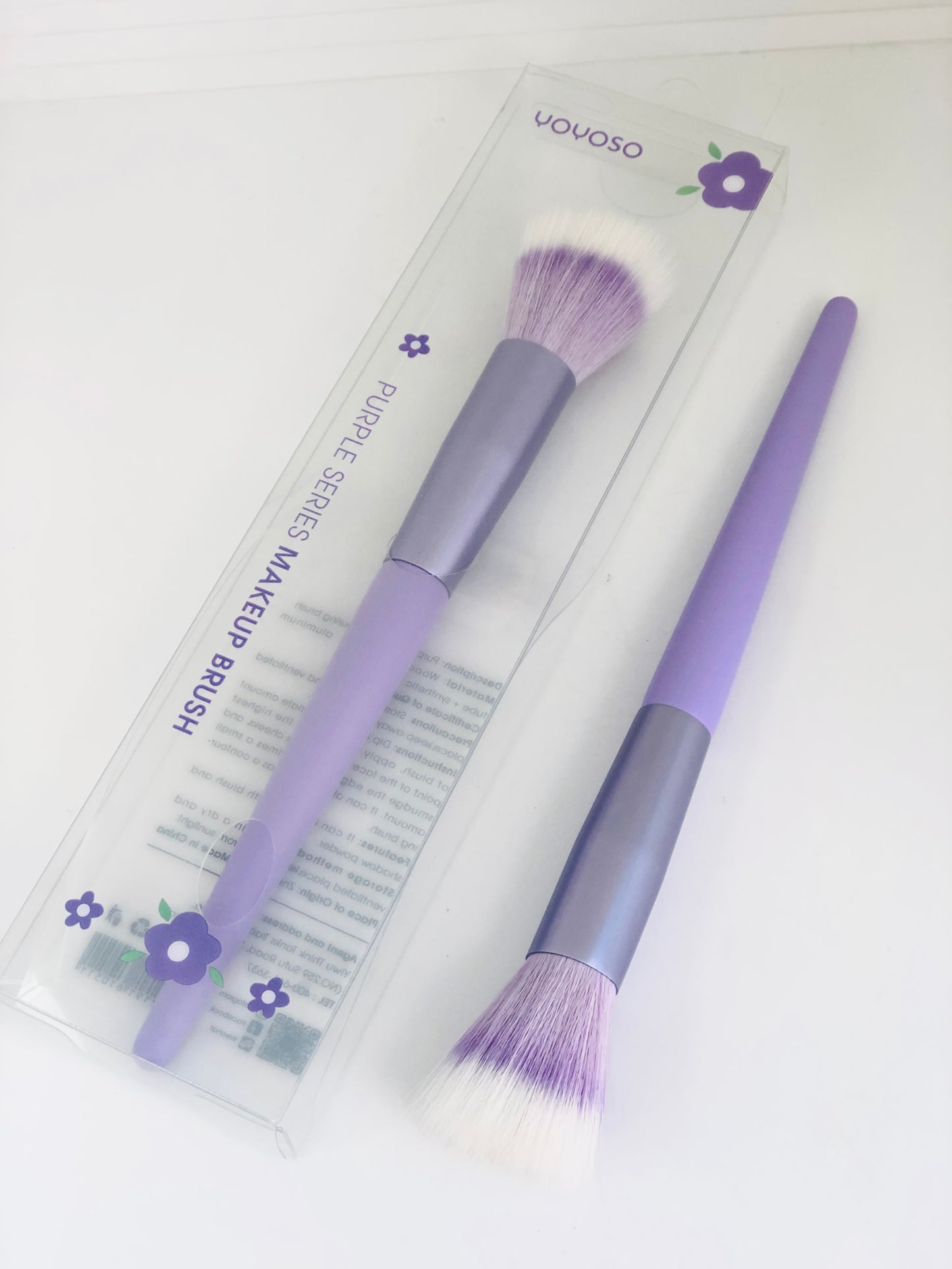 Medium purple makeup brush