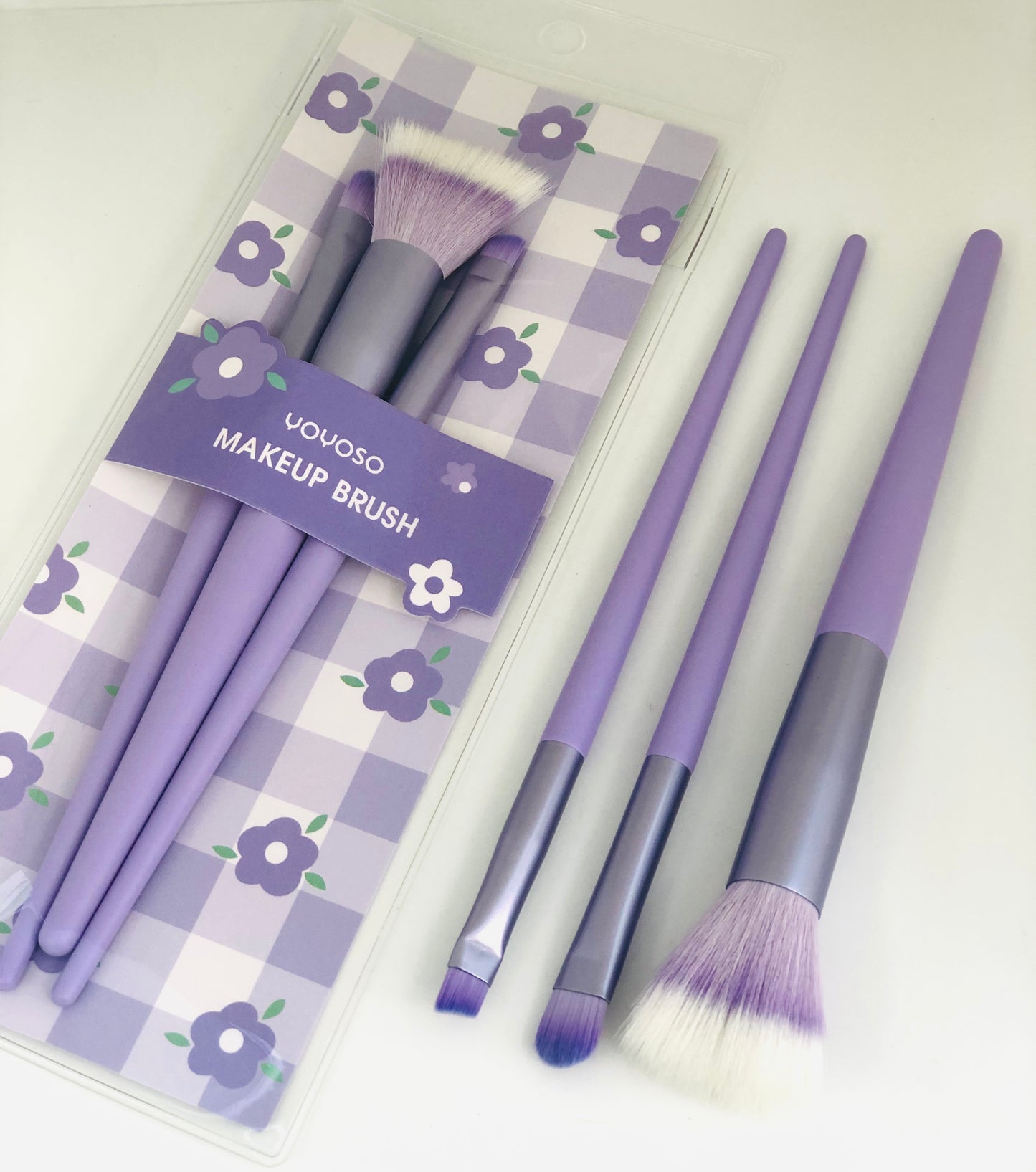 A package of mixed purple brushes