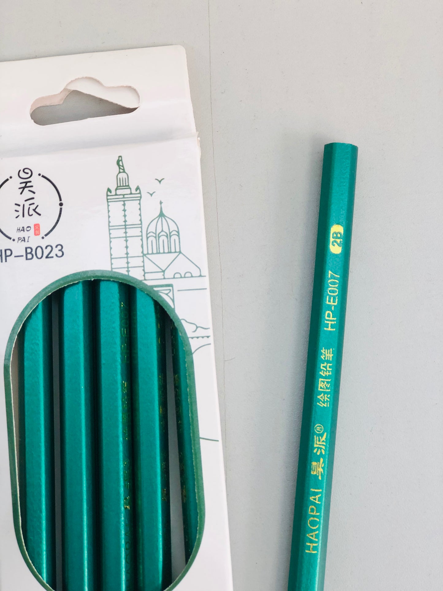 Package of green pencils, number 6