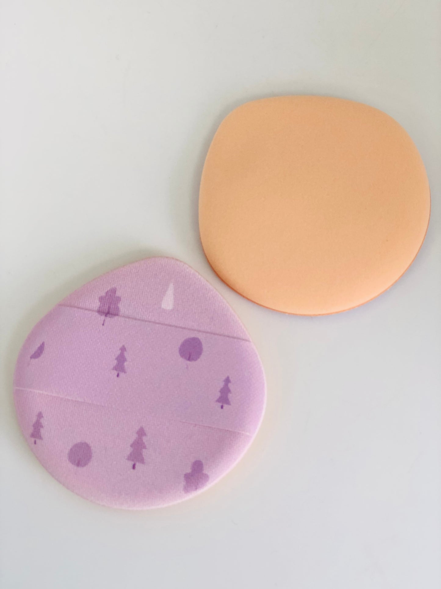 2 purple makeup sponges