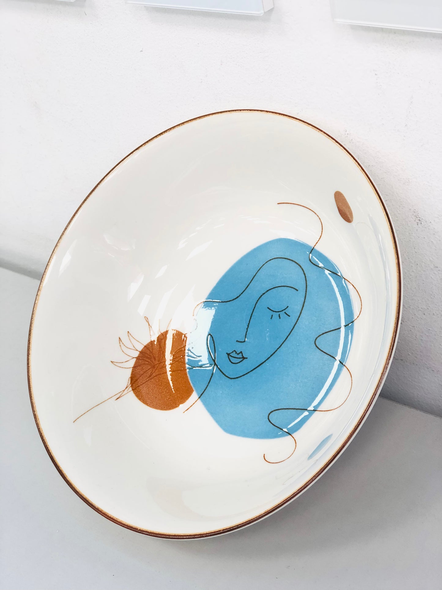 Ceramic plate with a random drawing, 7 inches