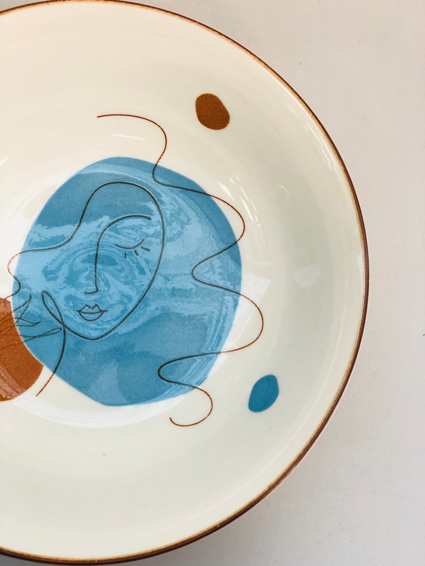 Ceramic plate with a random drawing, 7 inches
