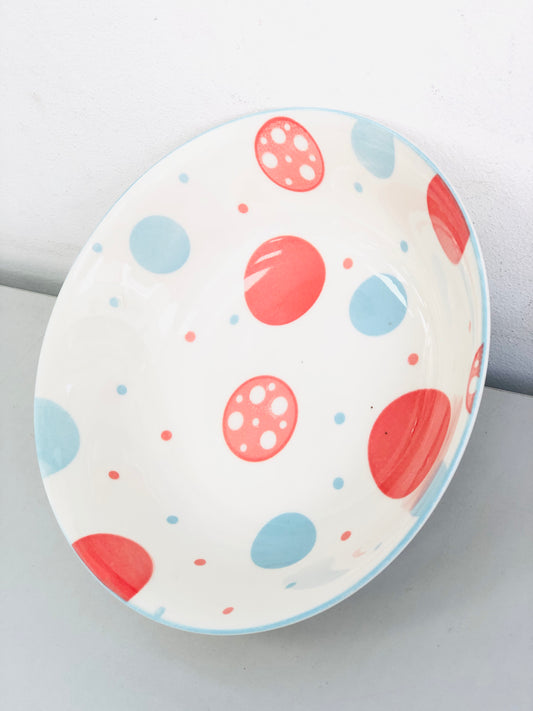 Ceramic plate with rounded circles, 7 inches
