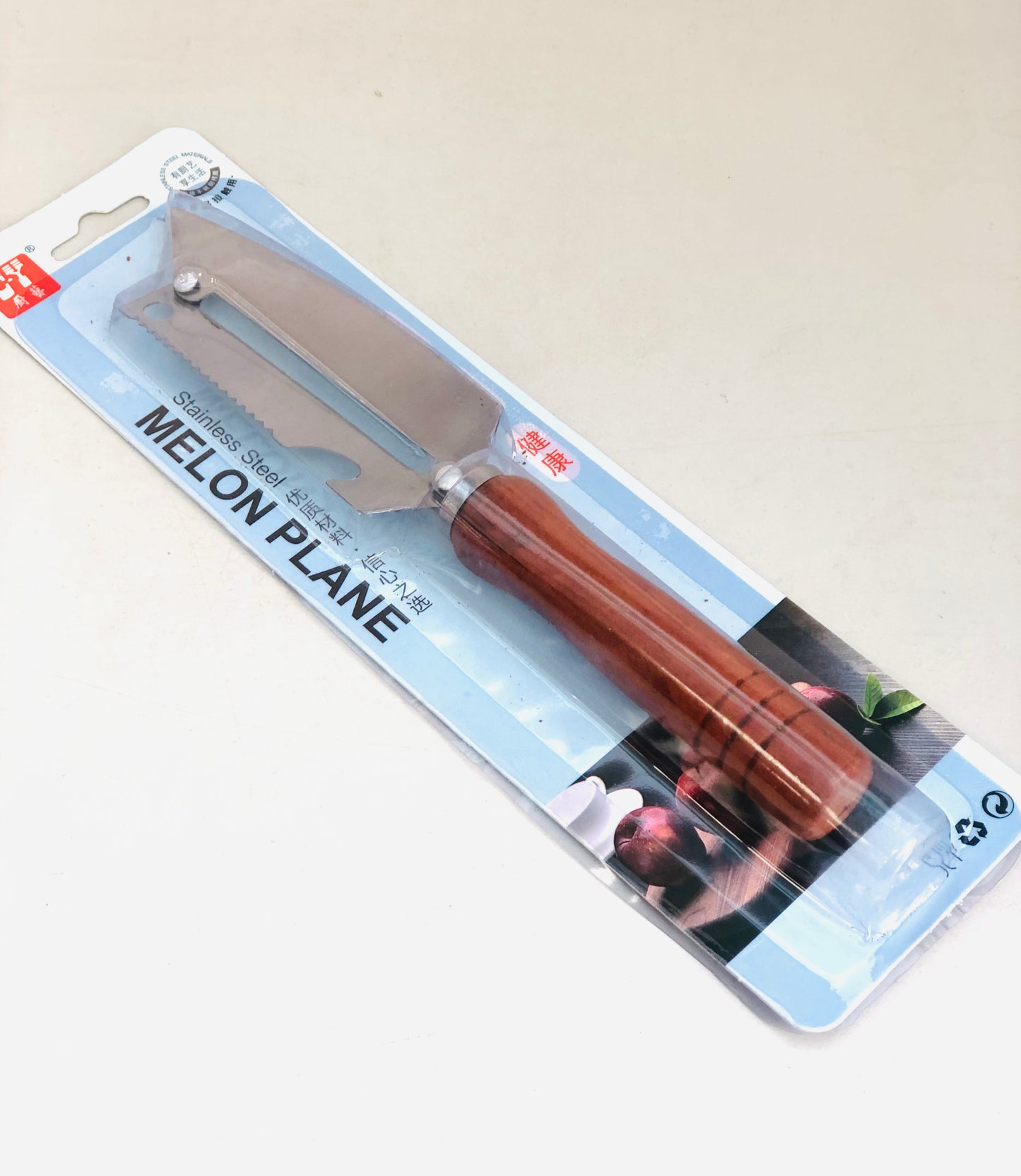 Knife with wooden handle peeler