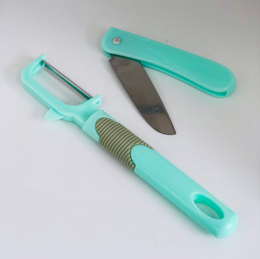 Peeler with folding knife