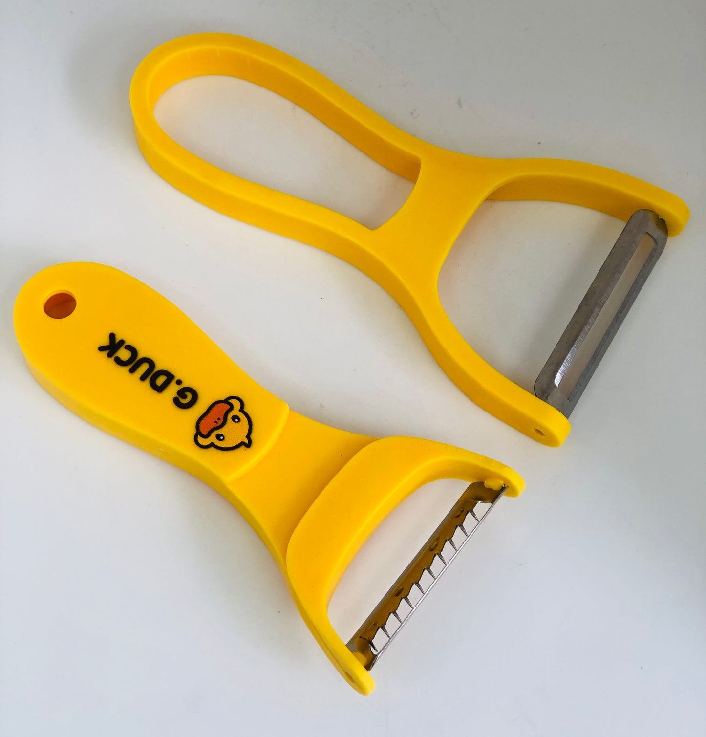 Duck-shaped food peeler, two pieces