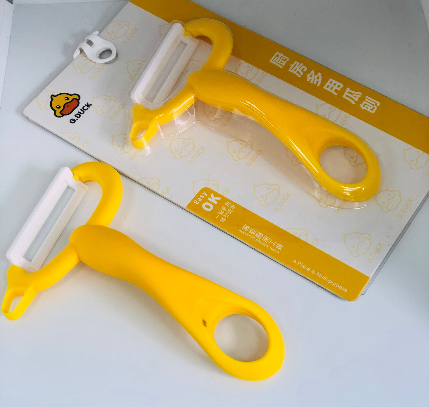 Yellow food peeler