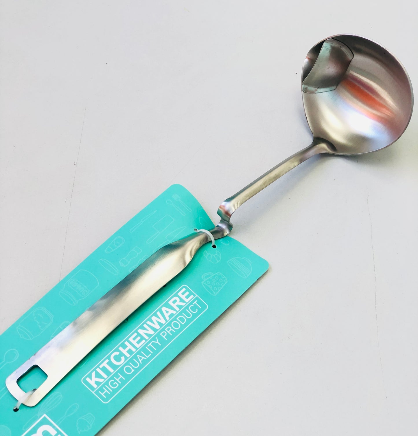 Stainless steel soup ladle with curly handle