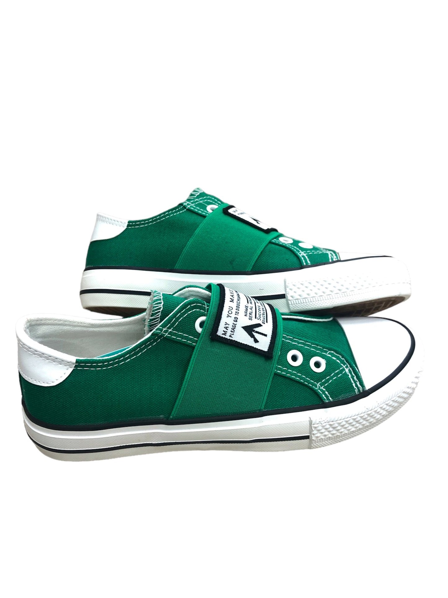 Green shoes with white lining