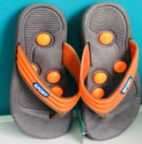 Orange and black medical circles toe pad