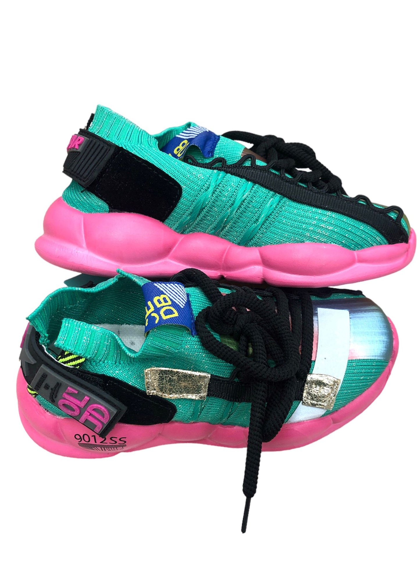 Green and pink children's shoes with black laces